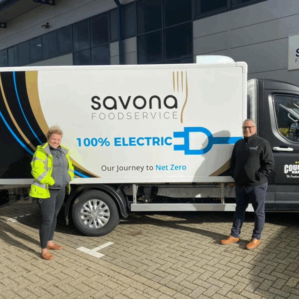 Savona staff stood next to electric van