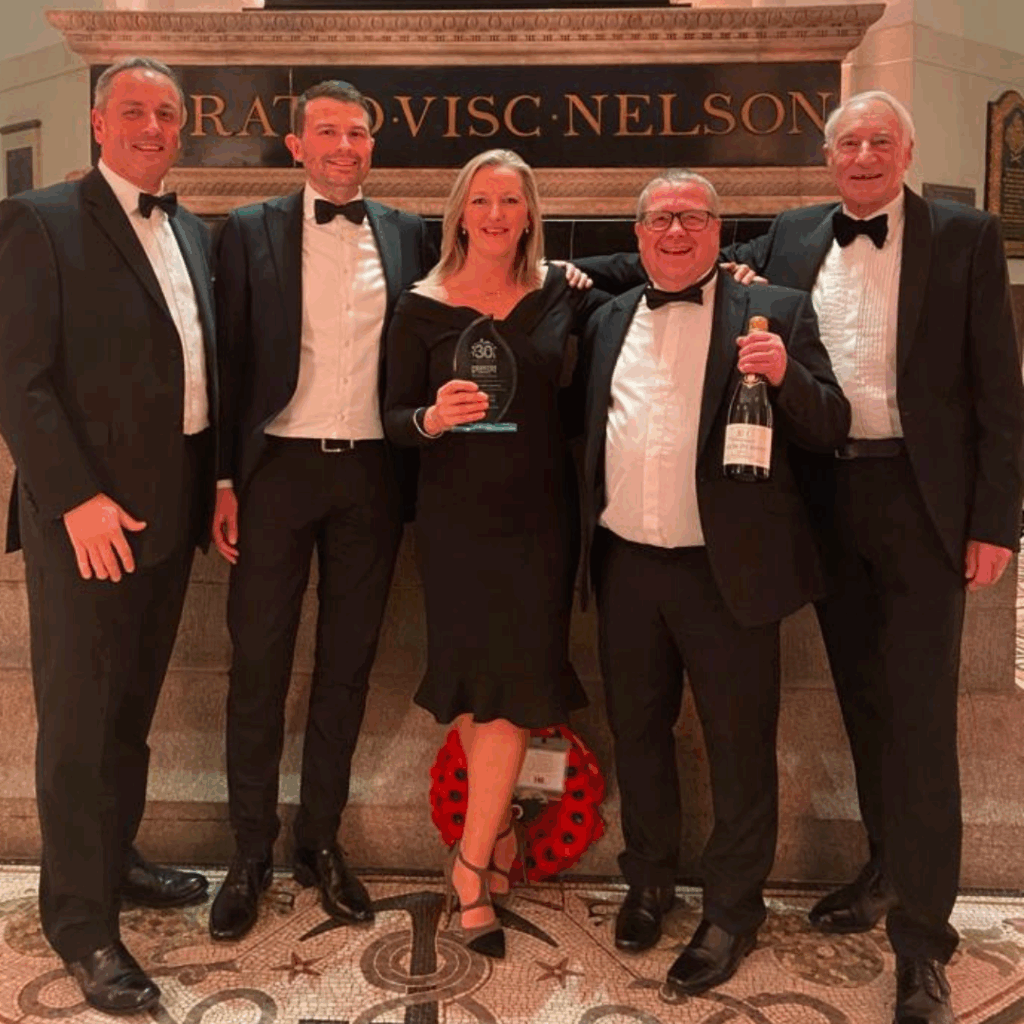 Savona Staff holding CRG Award