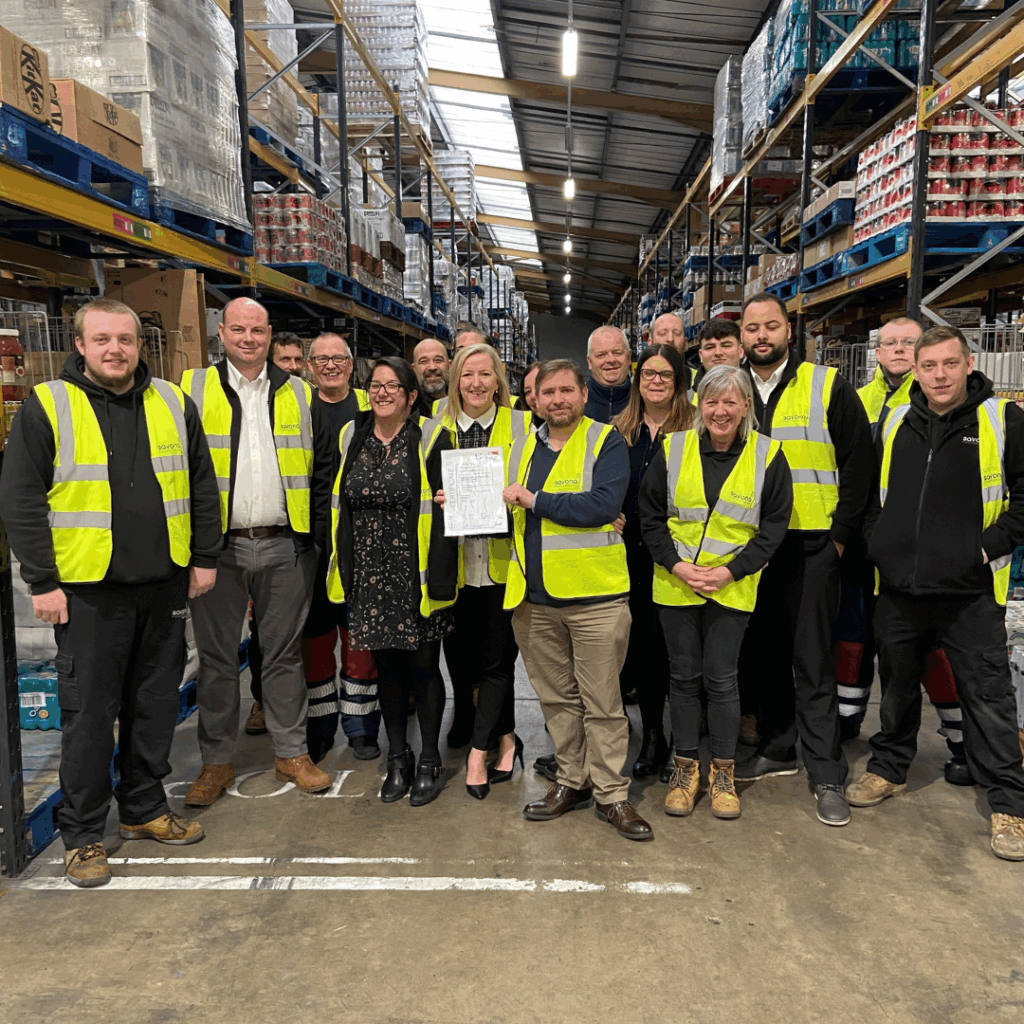 Savona staff holding BRCGS AA Award
