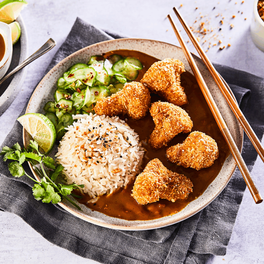 A katsu curry on a grey worktop