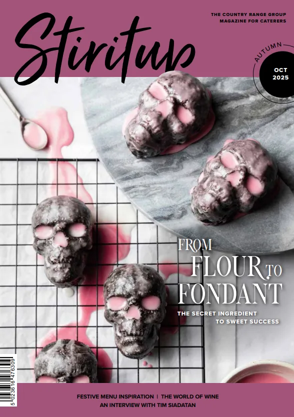 October Stir it up Cover, skulls made of fondant on a wire baking rack